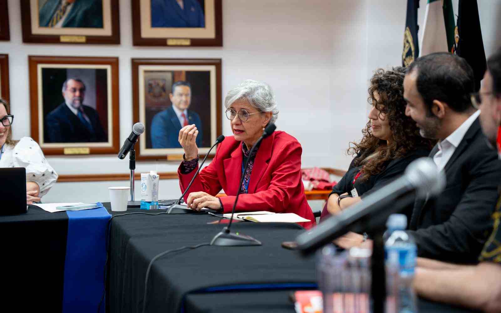 Woman talking in conference